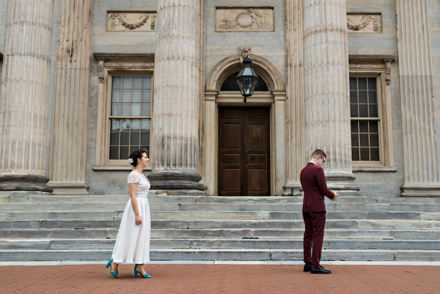 A bride and groom about to have their first look in front of the First Bank of the United States in Philadelphia.